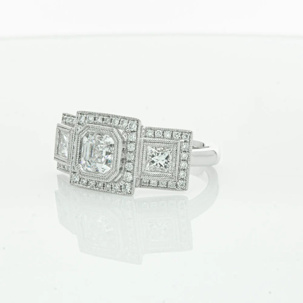 18ct White Gold 1.01ct Emerald Cut Diamond Halo Ring