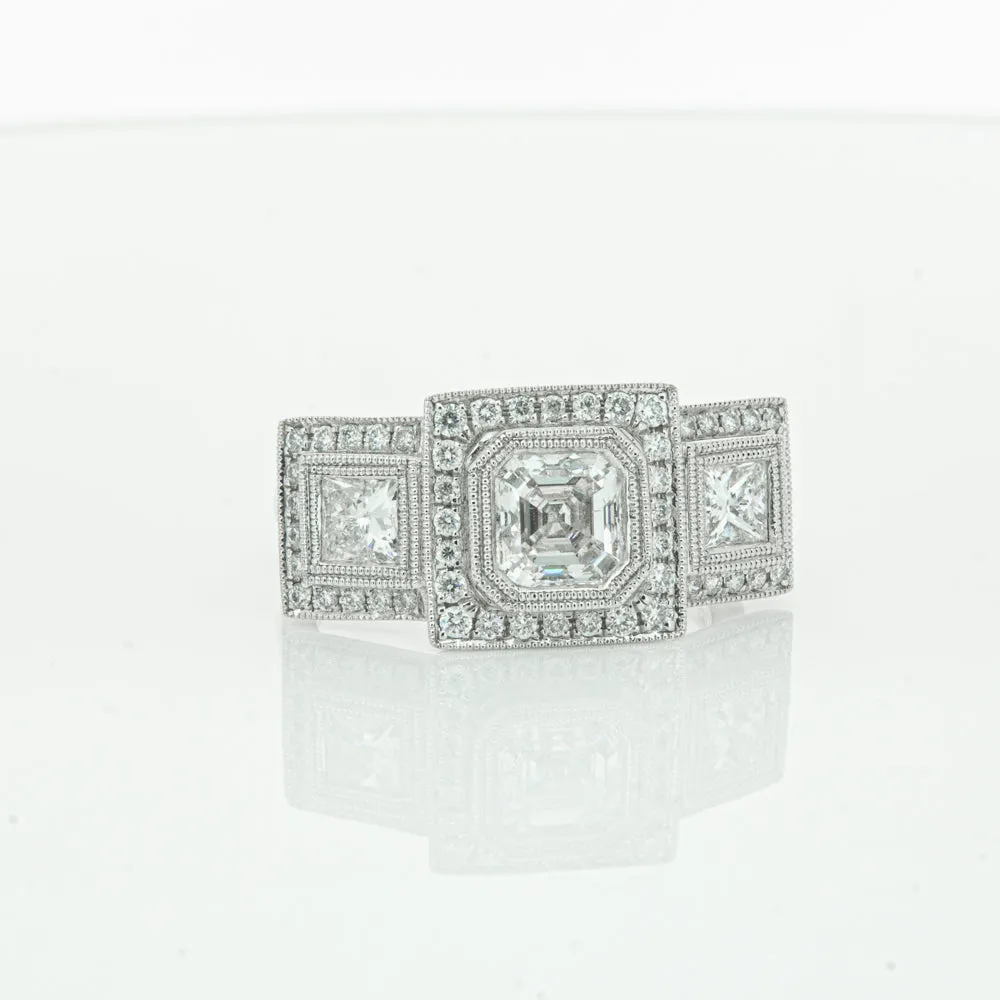 18ct White Gold 1.01ct Emerald Cut Diamond Halo Ring